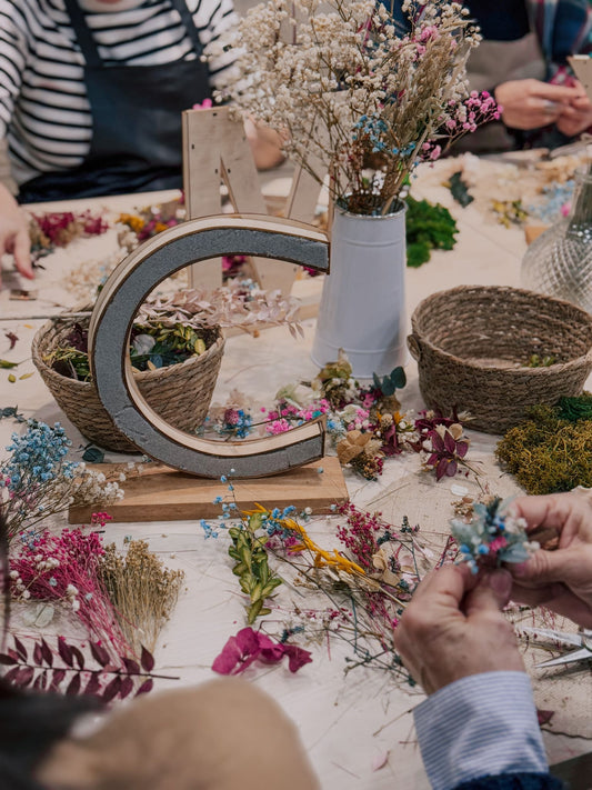 Taller letras de flores preservadas